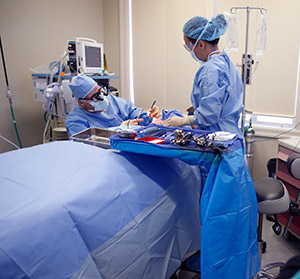 Dr. Denkler performing surgery in the private ambulatory surgical facility in Larkspur, CA