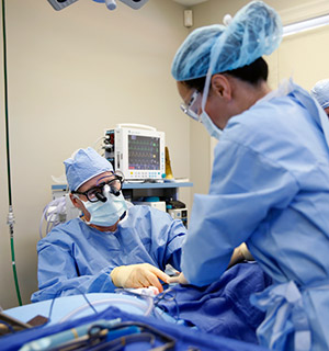 Dr. Denkler performing plastic surgery in Aesthetic Surgery's private operating room in Larkspur, California
